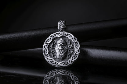Silver Odin Pendant featuring a detailed Nordic design with an intricate braided border and a bearded Odin face in the center, crafted in polished silver for a striking chain necklace.