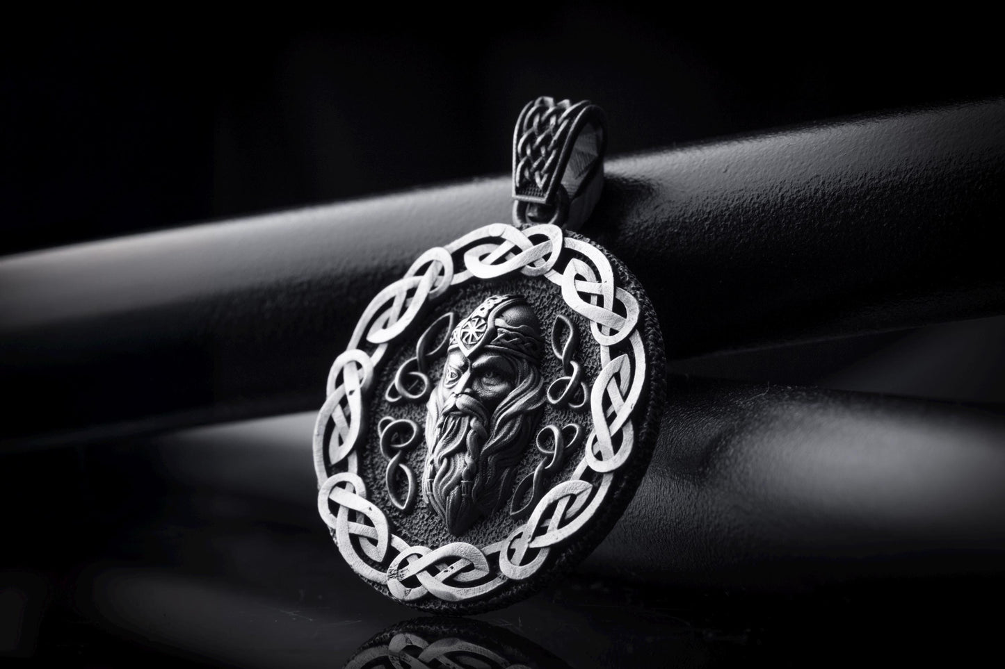Silver Odin Pendant featuring a detailed Norse god face design surrounded by an intricate Celtic knot border, crafted in polished silver for a bold chain necklace centerpiece.