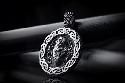 Silver Odin Pendant featuring a detailed Norse god face design surrounded by an intricate Celtic knot border, crafted in polished silver for a bold chain necklace centerpiece.