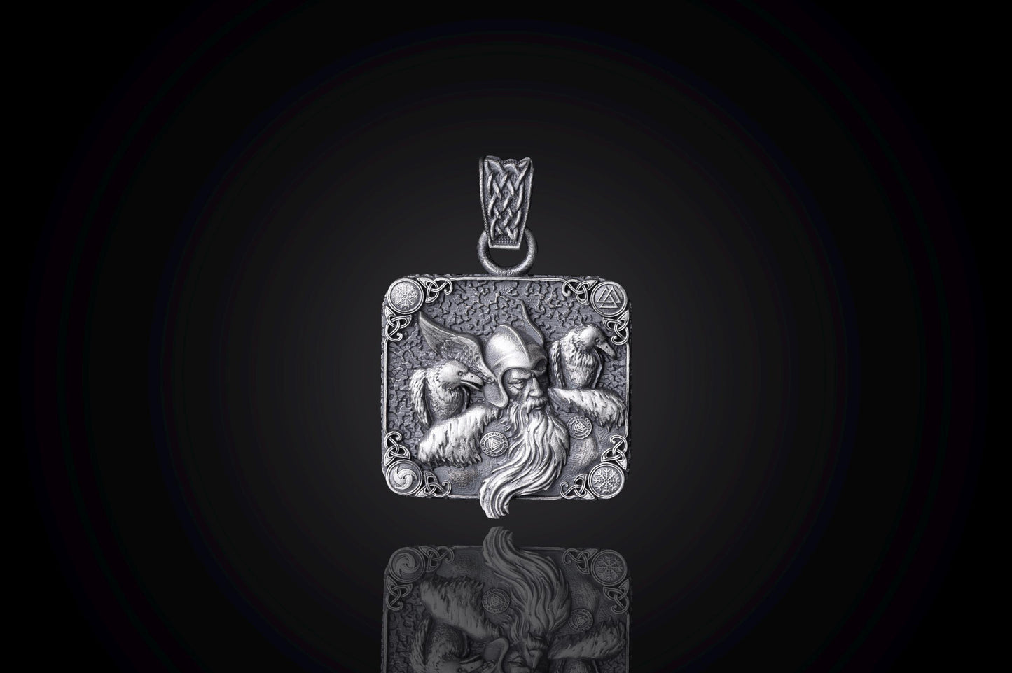 Intricately detailed Scandinavian Viking Pendant featuring a Viking warrior's face sculpted in silver, designed as a square pendant with ornamental corners and a braided bail for a chain necklace.