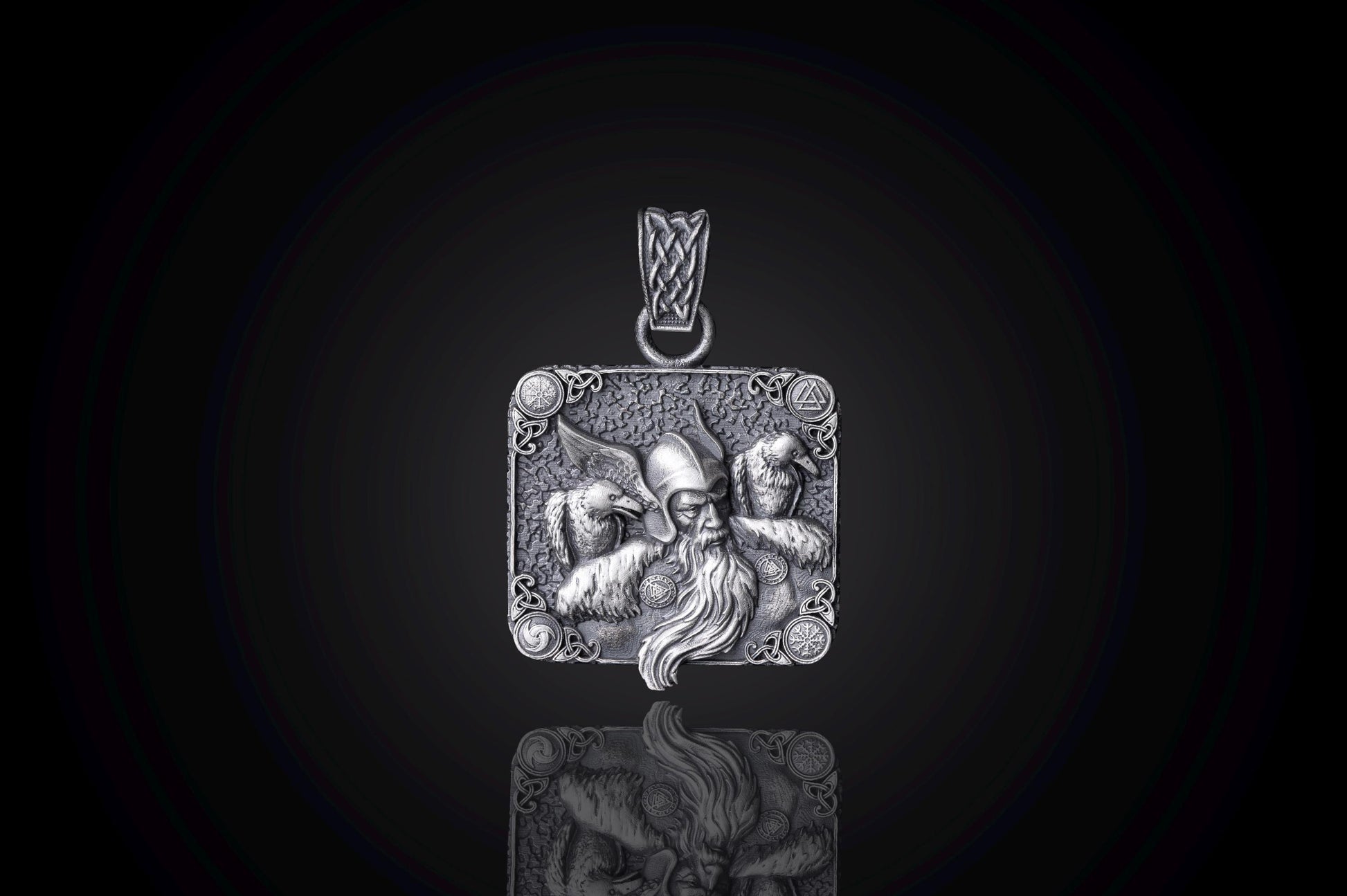 Intricately detailed Scandinavian Viking Pendant featuring a Viking warrior's face sculpted in silver, designed as a square pendant with ornamental corners and a braided bail for a chain necklace.