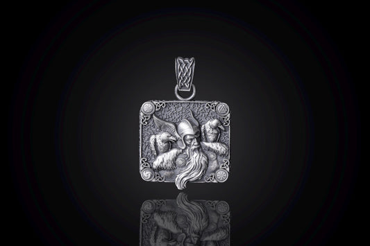 Intricately detailed Scandinavian Viking Pendant featuring a Viking warrior's face sculpted in silver, designed as a square pendant with ornamental corners and a braided bail for a chain necklace.