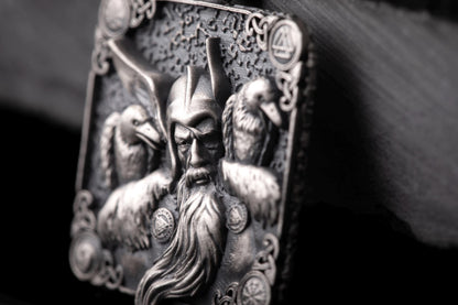 Close-up of a detailed silver Scandinavian Viking Pendant featuring a Viking warrior with a long beard and two ravens, showcasing intricate craftsmanship.