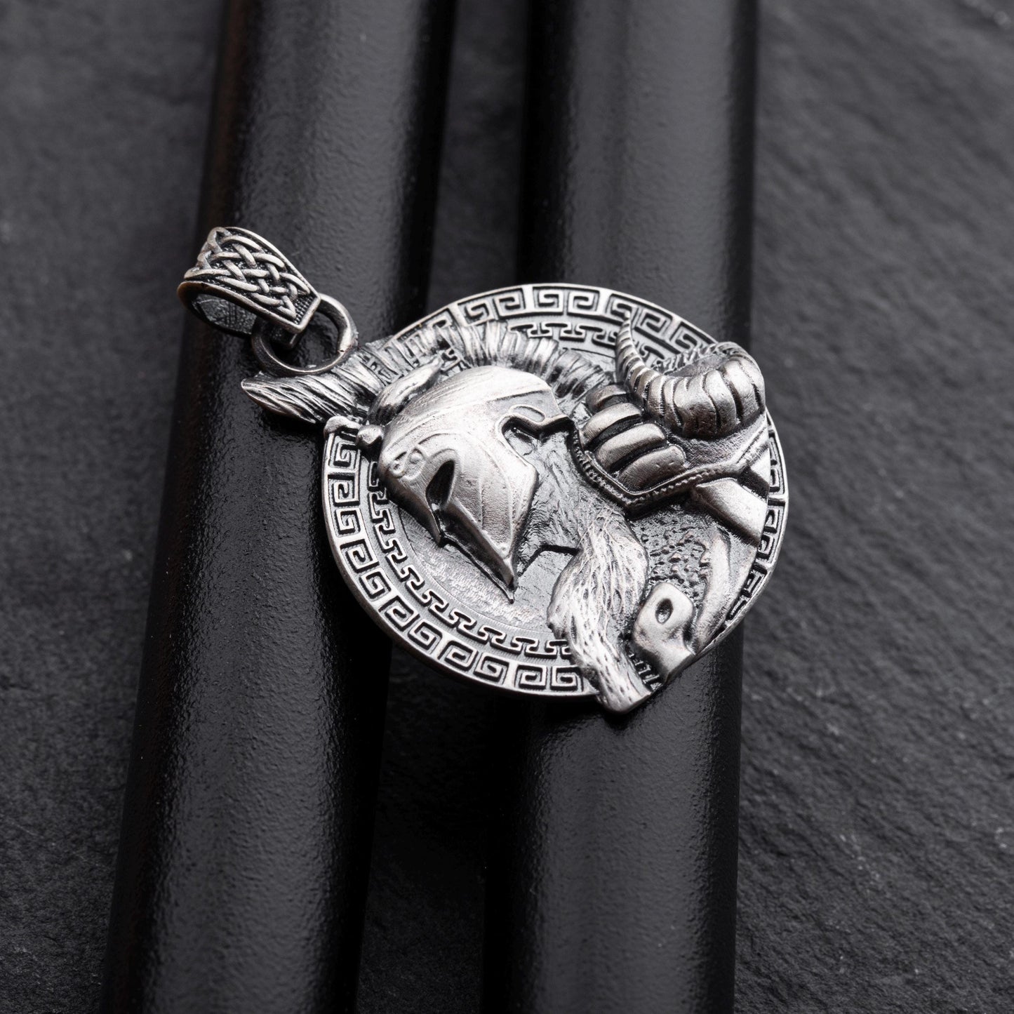 Gladiator Pendant featuring a detailed silver design of a warrior helmet with horns and intricate patterns, perfect for chain necklaces or silver jewellery collections.