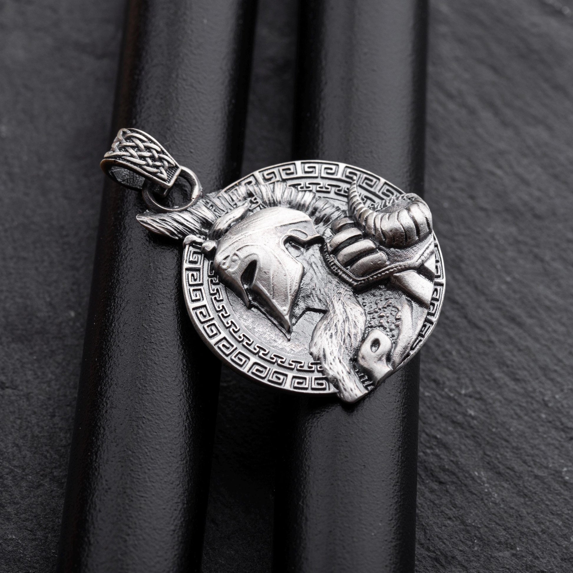 Gladiator Pendant featuring a detailed silver design of a warrior helmet with horns and intricate patterns, perfect for chain necklaces or silver jewellery collections.