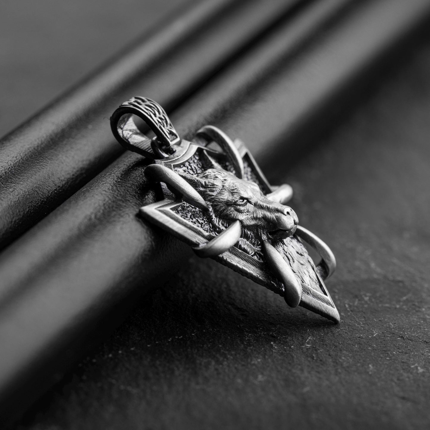 Sterling Silver Arrowhead Wolf Pendant featuring a detailed wolf head design on an arrowhead-shaped silver pendant, ideal for chain necklaces and silver jewelry collections.