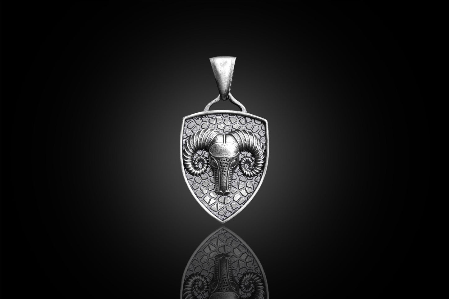Aries Ram Pendant featuring a detailed ram head design on a textured shield-shaped silver pendant, perfect for those seeking unique silver jewellery.