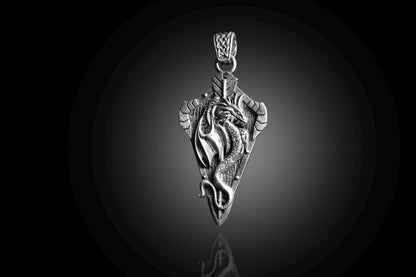 Intricately designed Sterling Silver Dragon Arrowhead Pendant featuring a detailed dragon wrapped around an arrowhead shape, perfect as a unique silver jewellery pendant.